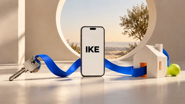 A blue ribbon connects a set of keys, an IKE phone, and a home